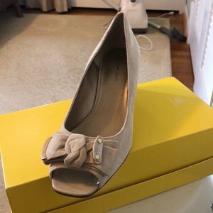 Cream color suede wedge shoes